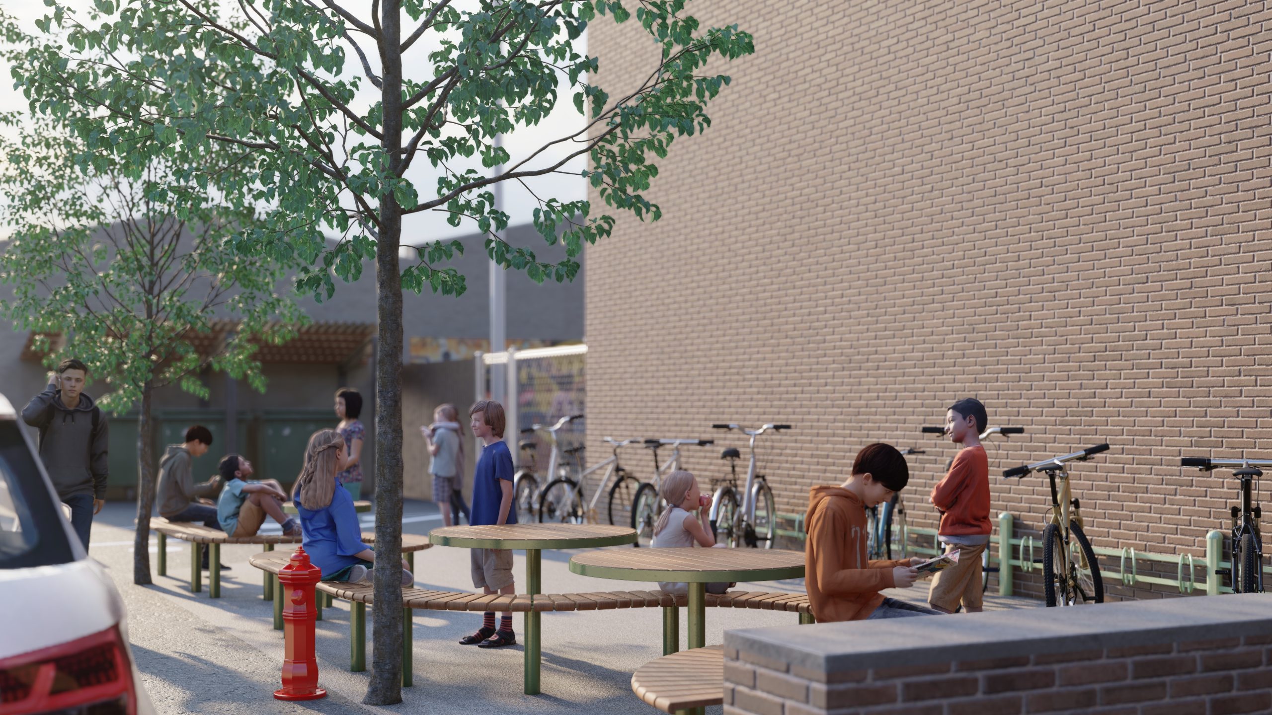 Render of a busy school area, with benches and seating areas, and bike racks.